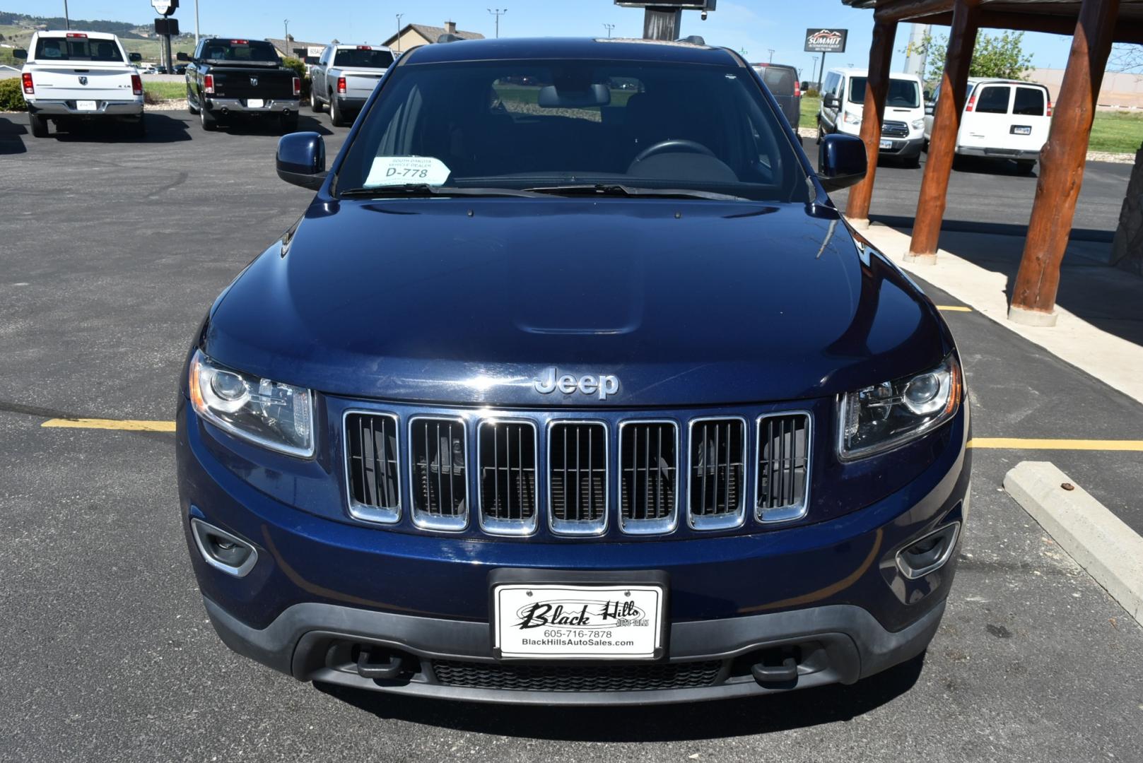 2014 Blue /Black Jeep Grand Cherokee Laredo (1C4RJFAG6EC) with an 3.6L V6 24 Valve VVT engine, 8-Speed Automatic transmission, located at 1600 E Hwy 44, Rapid City, SD, 57703, (605) 716-7878, 44.070232, -103.171410 - Photo#1